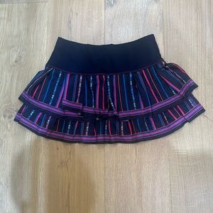 LUCKY IN LOVE TENNIS SKIRT